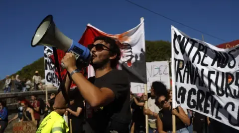 Nationwide Strikes Break Out In Response to Spending Cuts
